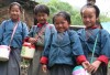 Nụ cười hồn nhiên, hạnh phúc trên khuôn mặt trẻ em Bhutan (Ảnh: Sandokaiproductions.com)