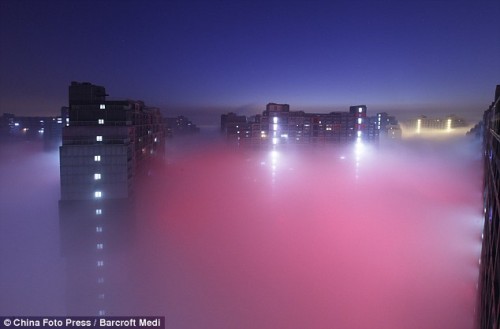 Mức độ ô nhiễm không khí tại thủ đô Bắc Kinh tăng ở mức báo động vào ngày 12/1 (Ảnh: China Foto Press)