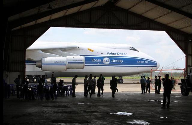 A Russian cargo plane waits at Bien Hoa Air Force Base before being loaded with highly enriched uranium and departing for Russia.