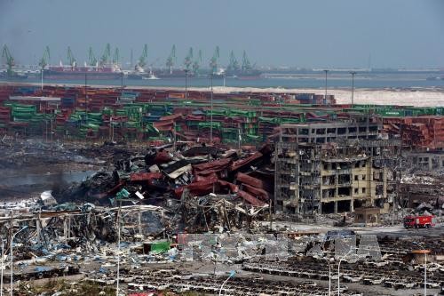 Cảnh đổ nát tại hiện trường vụ nổ ở Thiên Tân (Ảnh: AFP/TTXVN)