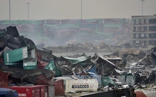 Mưa lớn tại khu vực vụ nổ ở Thiên Tân ngày 18/8 (Ảnh: THX/TTXVN)